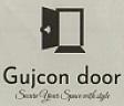 GUJCON DOOR (and logo) trademark logo