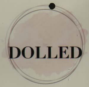 DOLLED (and logo) trademark logo