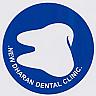 NEW DHARAN DENTAL CLINIC (and logo) trademark logo