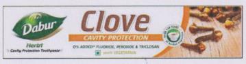 DABUR HERBAL CLOVE TOOTHPASTE (and logo) trademark logo