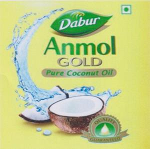ANMOL GOLD PURE COCONUT OIL (and logo) trademark logo