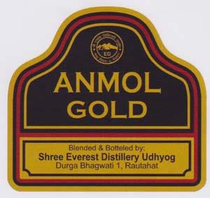 ANMOL GOLD (and logo) trademark logo