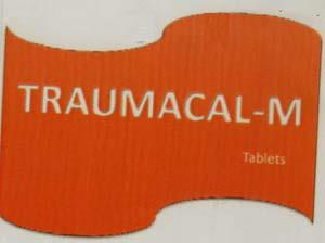 TRAUMACAL-M (and logo) trademark logo
