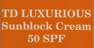 TD LUXURIOUS SUNBLOCK CREAM 50 SPF (and logo) trademark logo