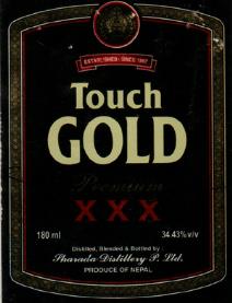 TOUCH GOLD (and logo) trademark logo