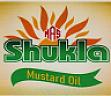 MAS SHUKLA MUSTARD OIL (and logo) trademark logo