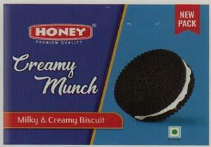 HONEY CREAMY MUNCH (and logo) trademark logo