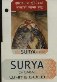 SURYA 24 CARAT WHITE GOLD (and logo) trademark logo