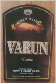 VARUN DELUXE (and logo) trademark logo