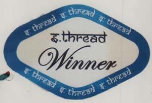 WINNER (and logo) trademark logo