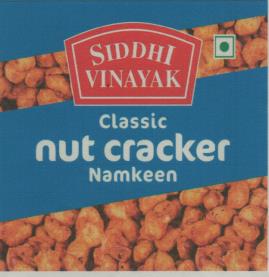 SIDDHI VINAYAK NUT CRACKER (and logo) trademark logo