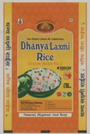DHANYA LAXMI (and logo) trademark logo