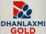 DHANLAXMI GOLD (and logo) trademark logo