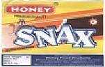 HONEY SNAX (and logo) trademark logo