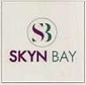 SKYN BAY (and logo) trademark logo