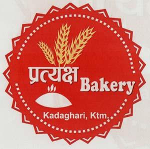 PRATYAKSH BAKERY (and logo) trademark logo