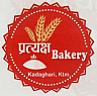 PRATYAKSH BAKERY (and logo) trademark logo