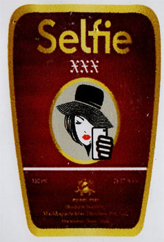 SELFIE XXX (and logo) trademark logo