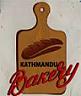 KATHMANDU BAKERY (and logo) trademark logo