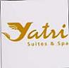 YATRI SUITES & SPA (and logo) trademark logo