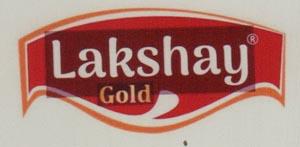 LAKSHAY GOLD (and logo) trademark logo